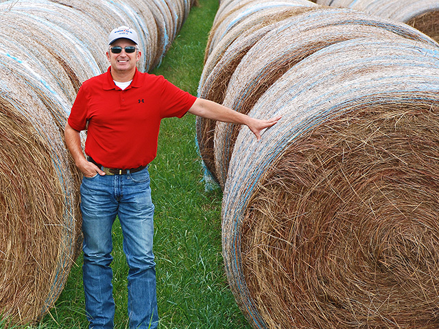 Oklahoma cattle producer Dax Burchett feeds 2,500 big bales of hay to his 800-head commercial herd each year. Cutting waste is a priority. (DTN/Progressive Farmer photo by Mark Parker)